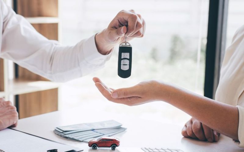 Duplicate car key being professionally cut at a locksmith workshop – spare car keys service in Leigh